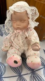 Bambola neonato con carillon