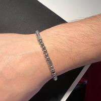 Bracciale elastico con sfere metalliche unisex