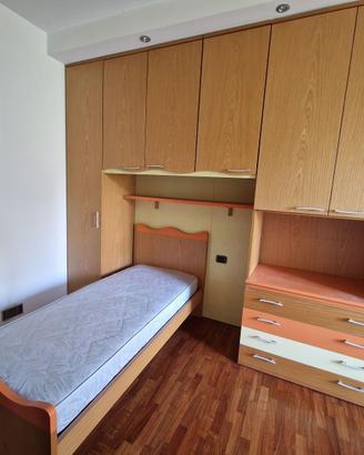 Armadio ponte con letto