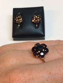 Orecchini in oro giallo 750 e granati