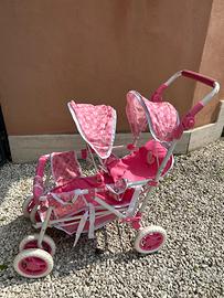 Passeggino gemelli giocattolo