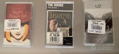 U2 - the door - cindy lauper cassetta nuove leggi