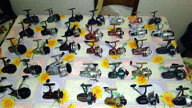 Lotto 35 vecchi mulinelli in metallo