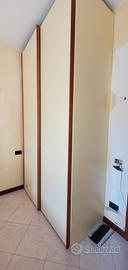Armadio in legno con ante scorrevoli – h 260 cm –
