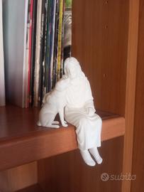 statuetta Gesù seduto con cane