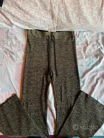 pantaloni a zampa brillantinati oro