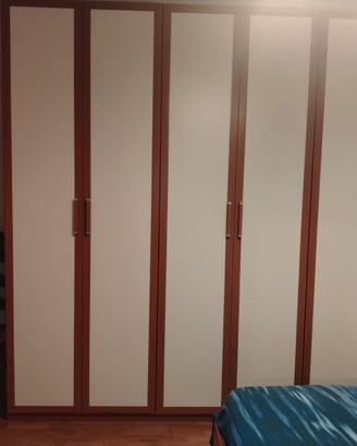 camera completa di armadio letto comodini.