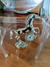 orologio da tavolo in scultura 