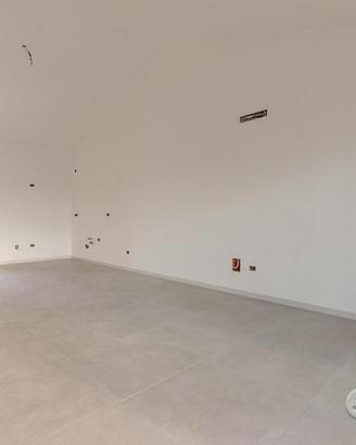 Attico di nuova costruzione con posto auto