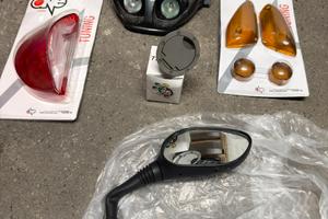 Faro, tappo serbatoio, frecce e stop