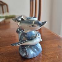 Portacandela con delfini