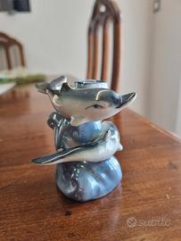 Portacandela con delfini