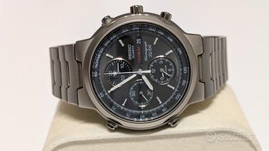 Seiko SQ100 Titanium zaffiro 7t32-6f20 crono