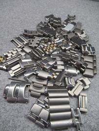 Lotto 300 grammi di maglie sfuse per orologi
