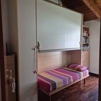 Camera Singola a ponte con letto in legno