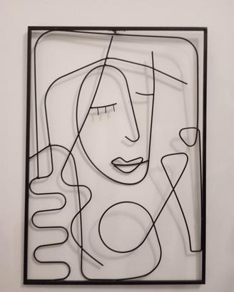 Quadro in metallo con donna