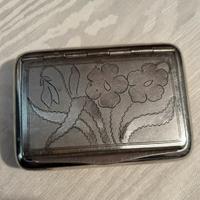 Per collezionisti:portatabacco in metallo, anni 20