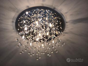 lampadario moonlight di Ideal lux con diametro 60