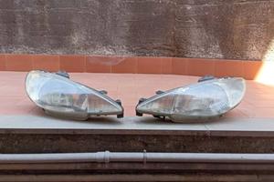 Fanali anteriori Peugeot 206 originali 