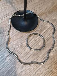 Parure collana e bracciale di metallo