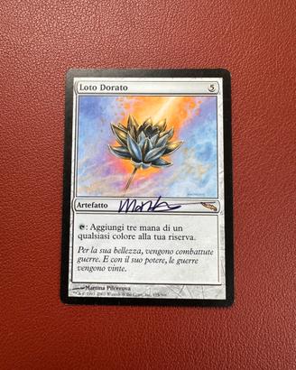 Logo dorato Magic the Gathering firmata