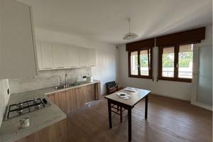 porzione di casa con giardino