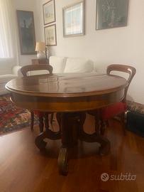 Tavolo antico rotondo allungabile in noce