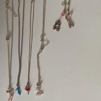 4 Collanine 4 braccialetti con ciondoli