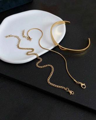Set con 3 bracciali dorati