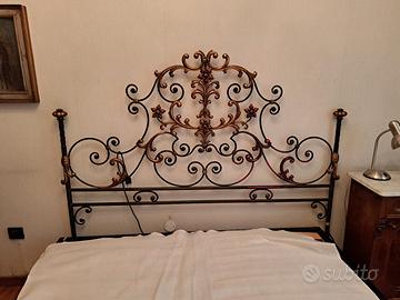 letto in ferro battuto con doghe