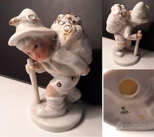 Porcellana - Bimbo con gerla - Marchio N