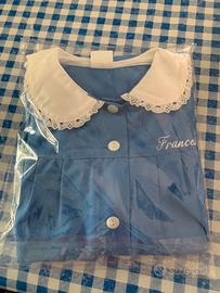 Grembiule 100% cotone per bambina di 8–9 anni.