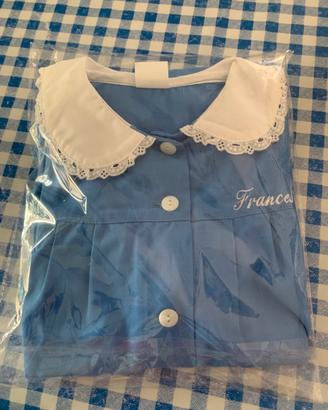 Grembiule 100% cotone per bambina di 8–9 anni.