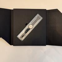 Swatch black motion automatic con libro