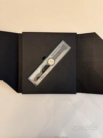 Swatch black motion automatic con libro