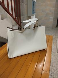 Borsa oro e bianca