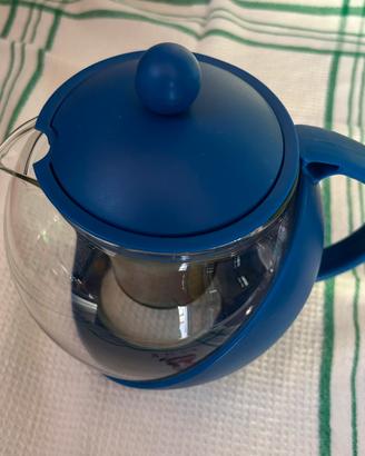 Teiera in vetro e plastica blu