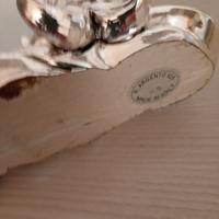 cornice con base bagnata in argento 