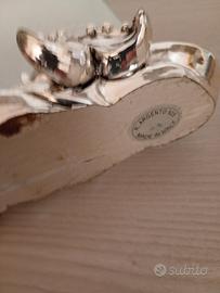 cornice con base bagnata in argento 