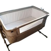 lettino kinderkraft next to me. 