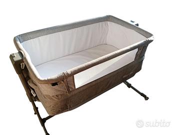 lettino kinderkraft next to me. 