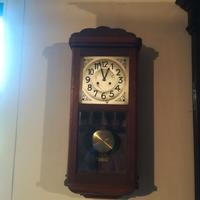 orologio a pendolo da parete