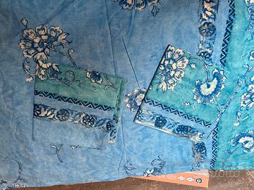 Parure copripiumino matrimoniale.