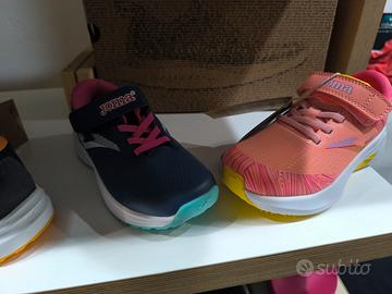 scarpe bambino stock 
