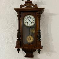 Orologio a pendolo da parete vintage