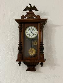 Orologio a pendolo da parete vintage