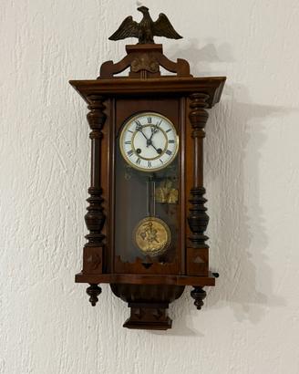 Orologio a pendolo da parete vintage