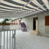 Appartamento piano terra con giardino