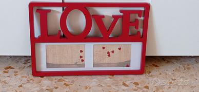 cornice rossa per due foto