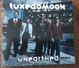 Per collezionisti cd+dvd Tuxedo Moon "Unearthed"